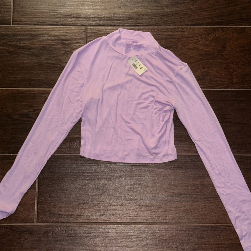 Aero Purple long sleeved shirt. Never worn with tags.